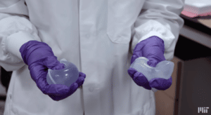 two pills in hands