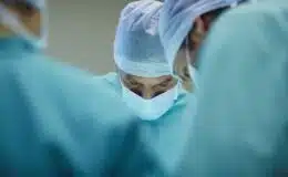 Surgeons working on patient